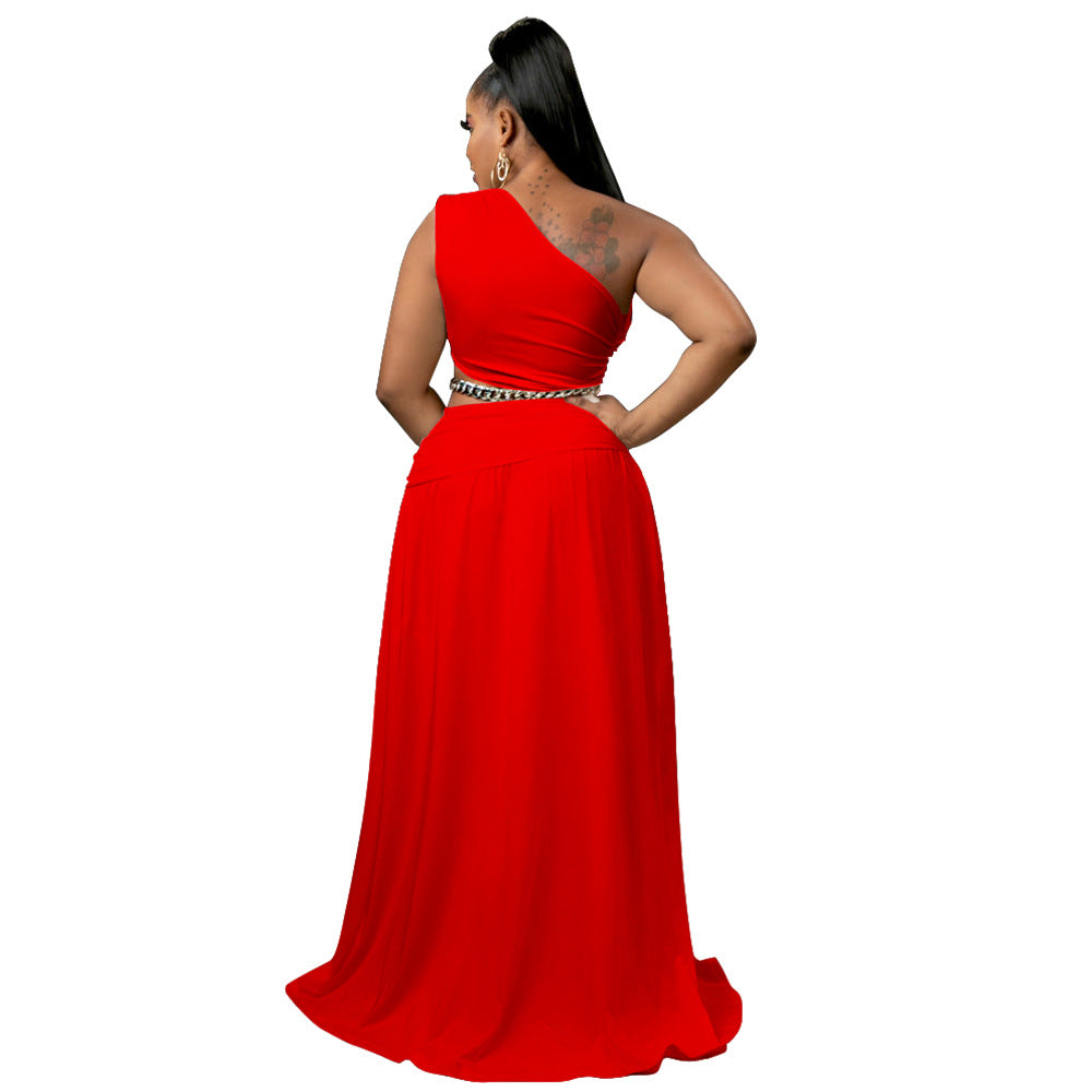Woman wearing a red one-shoulder dress on a white background