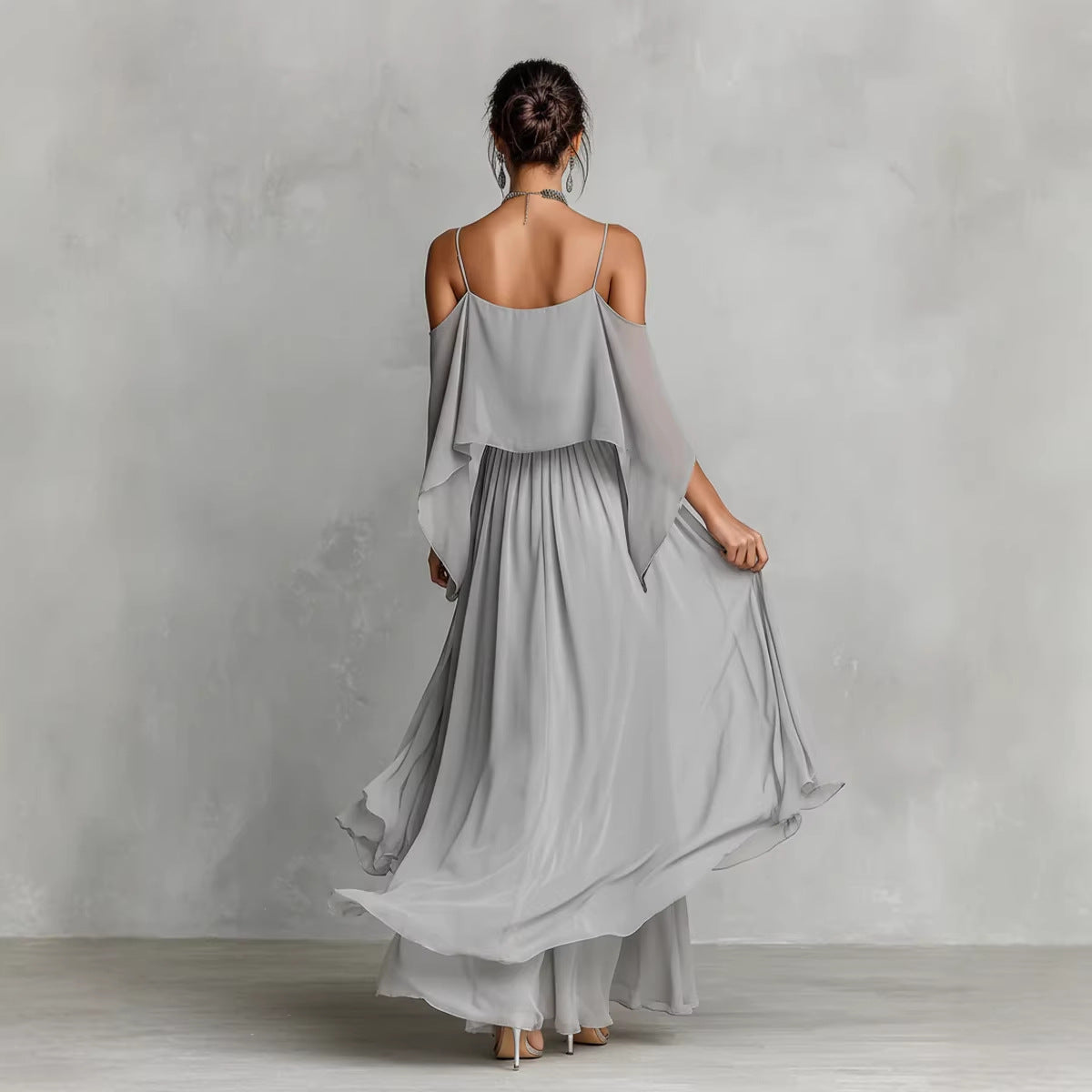 Women's light gray chiffon cold-shoulder maxi dress with spaghetti straps and ruffled overlay, front view – Blutiful