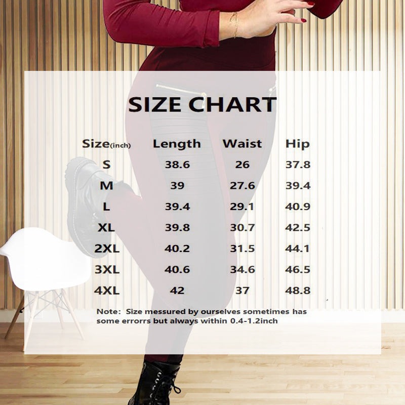 Person wearing a burgundy dress with a size chart overlay on a wooden floor.