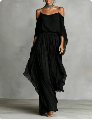 Women's black chiffon cold-shoulder maxi dress with spaghetti straps and draped overlay, front view – Blutiful