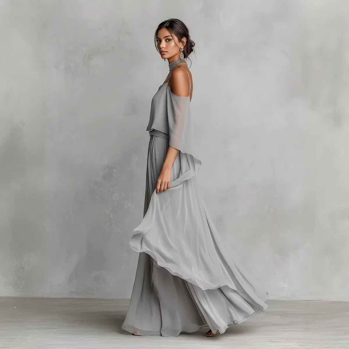 Women's light gray chiffon cold-shoulder maxi dress with spaghetti straps and ruffled overlay, front view – Blutiful